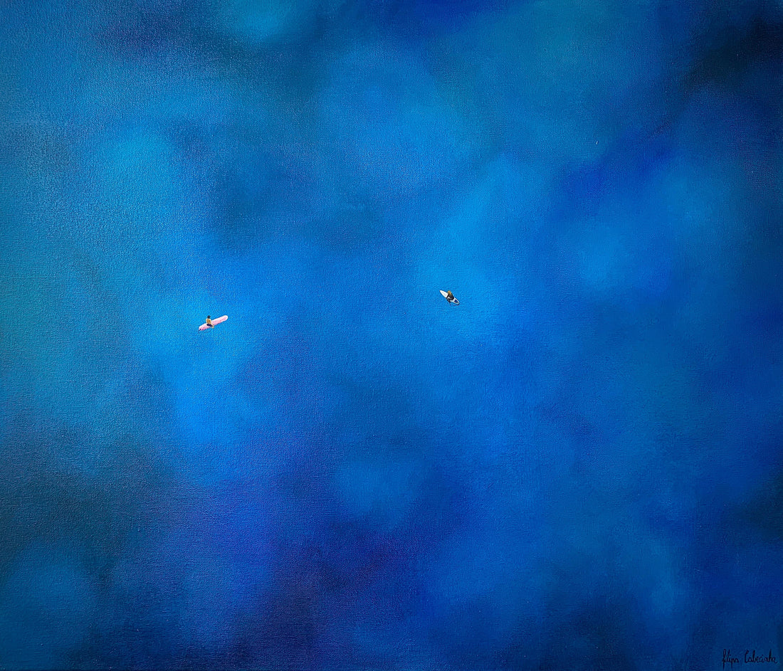 Aerial acrylic painting of a lone figure floating in deep blue ocean water, from The Depth of Blue by Filipa Cabecinha